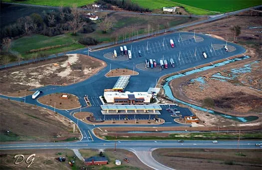 An aerial view of the Creek Travel Plaza building.